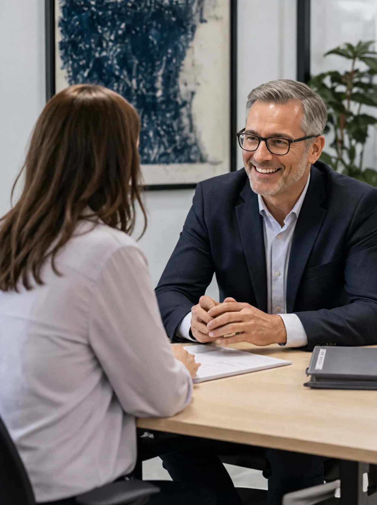 Professional services consultant meeting with a client